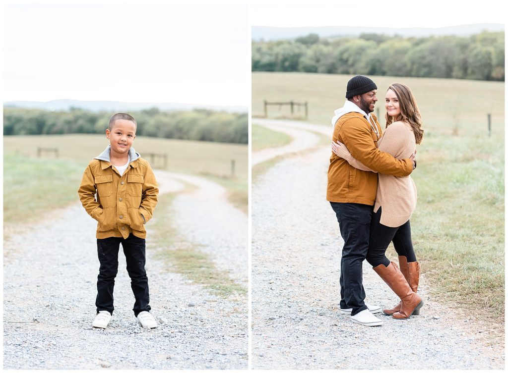 a mom and dad hug each other on a gravel road 