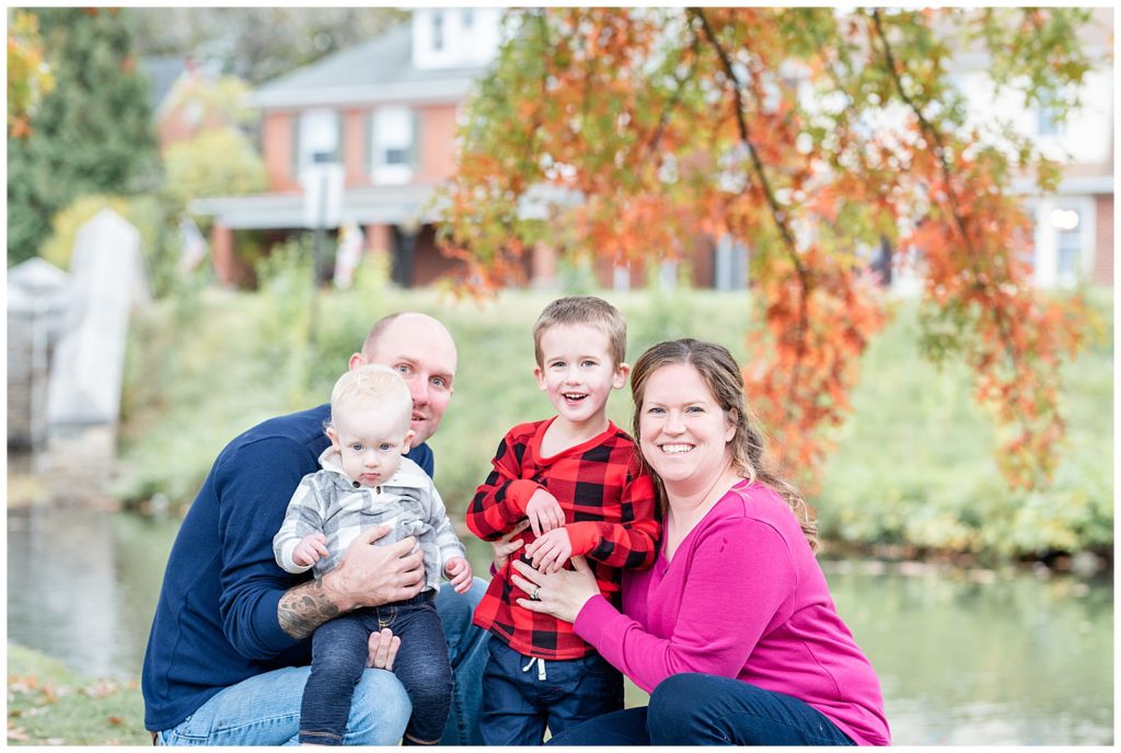 a fun family of 4 smiles for fall family pictures